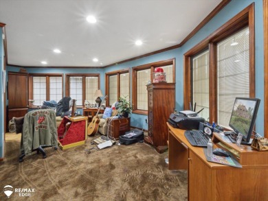 Set on nearly half an acre in Grand Blanc's sought-after Warwick on Warwick Hills Golf and Country Club in Michigan - for sale on GolfHomes.com, golf home, golf lot