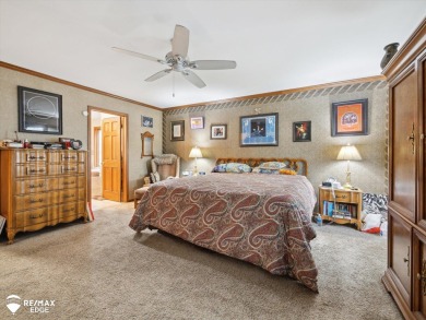 Set on nearly half an acre in Grand Blanc's sought-after Warwick on Warwick Hills Golf and Country Club in Michigan - for sale on GolfHomes.com, golf home, golf lot