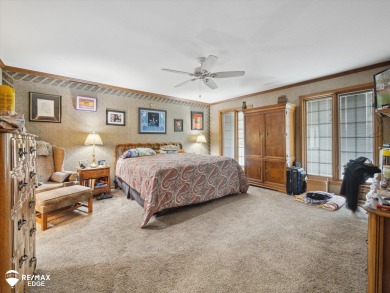 Set on nearly half an acre in Grand Blanc's sought-after Warwick on Warwick Hills Golf and Country Club in Michigan - for sale on GolfHomes.com, golf home, golf lot