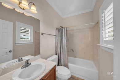 Beautiful meticulously maintained LOW maintenance home and yard on Peninsula Golf and Racquet Club in Alabama - for sale on GolfHomes.com, golf home, golf lot