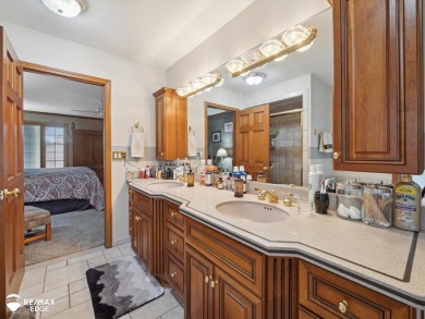 Set on nearly half an acre in Grand Blanc's sought-after Warwick on Warwick Hills Golf and Country Club in Michigan - for sale on GolfHomes.com, golf home, golf lot