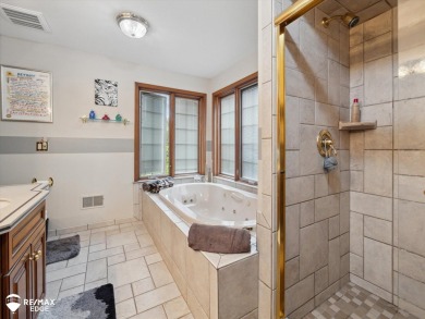 Set on nearly half an acre in Grand Blanc's sought-after Warwick on Warwick Hills Golf and Country Club in Michigan - for sale on GolfHomes.com, golf home, golf lot