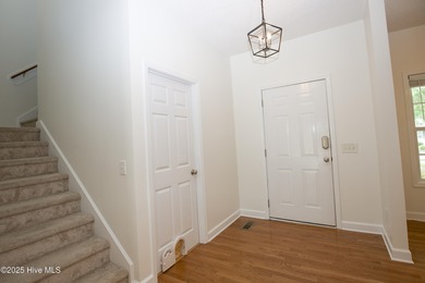 This well-kept 4 bed, 3 bath home is nestled in the heart of on Pinehurst Golf Course No. 8 in North Carolina - for sale on GolfHomes.com, golf home, golf lot