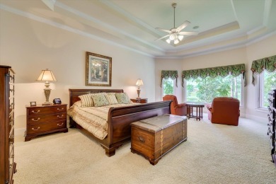 Stately home with stunning views overlooking Spalding Lake on Woodside Plantation Country Club in South Carolina - for sale on GolfHomes.com, golf home, golf lot