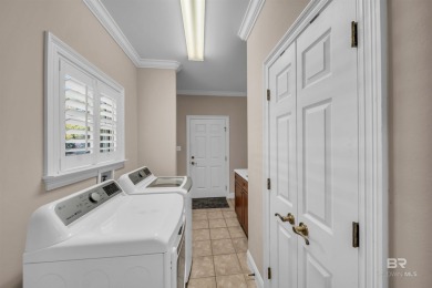Beautiful meticulously maintained LOW maintenance home and yard on Peninsula Golf and Racquet Club in Alabama - for sale on GolfHomes.com, golf home, golf lot