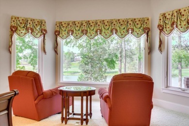 Stately home with stunning views overlooking Spalding Lake on Woodside Plantation Country Club in South Carolina - for sale on GolfHomes.com, golf home, golf lot