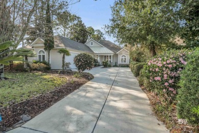 Beautiful meticulously maintained LOW maintenance home and yard on Peninsula Golf and Racquet Club in Alabama - for sale on GolfHomes.com, golf home, golf lot