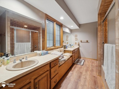 Set on nearly half an acre in Grand Blanc's sought-after Warwick on Warwick Hills Golf and Country Club in Michigan - for sale on GolfHomes.com, golf home, golf lot