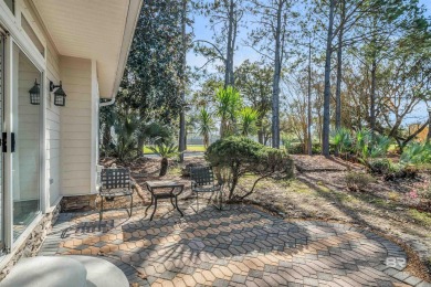 Beautiful meticulously maintained LOW maintenance home and yard on Peninsula Golf and Racquet Club in Alabama - for sale on GolfHomes.com, golf home, golf lot