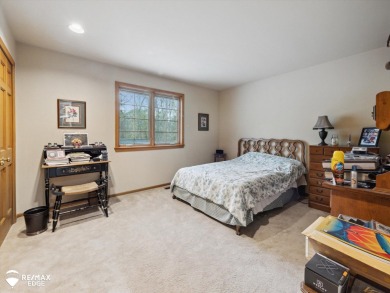 Set on nearly half an acre in Grand Blanc's sought-after Warwick on Warwick Hills Golf and Country Club in Michigan - for sale on GolfHomes.com, golf home, golf lot