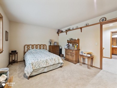 Set on nearly half an acre in Grand Blanc's sought-after Warwick on Warwick Hills Golf and Country Club in Michigan - for sale on GolfHomes.com, golf home, golf lot