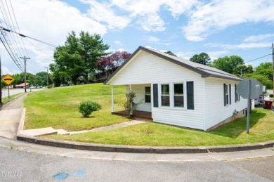 Welcome to your charming, fully remodeled bungalow! This on Pine Oaks Golf Club in Tennessee - for sale on GolfHomes.com, golf home, golf lot