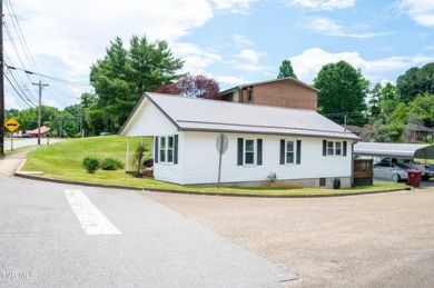 Welcome to your charming, fully remodeled bungalow! This on Pine Oaks Golf Club in Tennessee - for sale on GolfHomes.com, golf home, golf lot