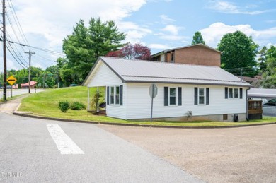 Welcome to your charming, fully remodeled bungalow! This on Pine Oaks Golf Club in Tennessee - for sale on GolfHomes.com, golf home, golf lot