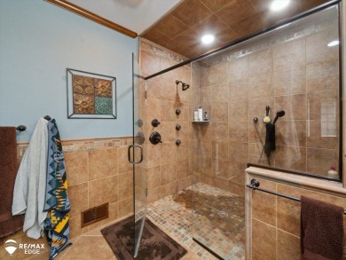 Set on nearly half an acre in Grand Blanc's sought-after Warwick on Warwick Hills Golf and Country Club in Michigan - for sale on GolfHomes.com, golf home, golf lot