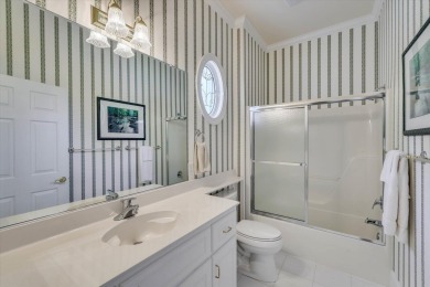 Stately home with stunning views overlooking Spalding Lake on Woodside Plantation Country Club in South Carolina - for sale on GolfHomes.com, golf home, golf lot