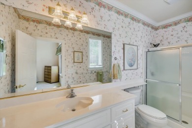 Stately home with stunning views overlooking Spalding Lake on Woodside Plantation Country Club in South Carolina - for sale on GolfHomes.com, golf home, golf lot