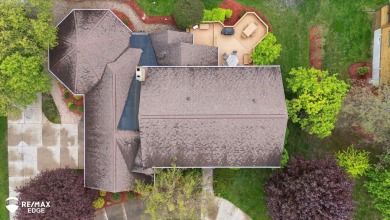 Set on nearly half an acre in Grand Blanc's sought-after Warwick on Warwick Hills Golf and Country Club in Michigan - for sale on GolfHomes.com, golf home, golf lot