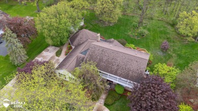Set on nearly half an acre in Grand Blanc's sought-after Warwick on Warwick Hills Golf and Country Club in Michigan - for sale on GolfHomes.com, golf home, golf lot