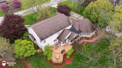 Set on nearly half an acre in Grand Blanc's sought-after Warwick on Warwick Hills Golf and Country Club in Michigan - for sale on GolfHomes.com, golf home, golf lot