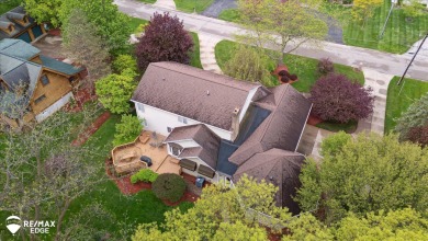 Set on nearly half an acre in Grand Blanc's sought-after Warwick on Warwick Hills Golf and Country Club in Michigan - for sale on GolfHomes.com, golf home, golf lot