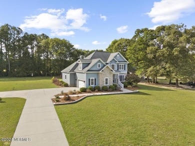 Welcome to this stunning two-story custom-built home with 2889 on Majestic Pines Golf and Country Club in North Carolina - for sale on GolfHomes.com, golf home, golf lot