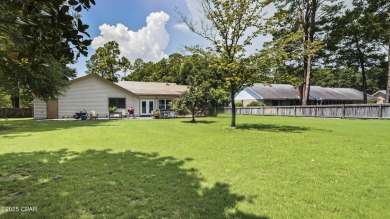 Golf Course Living on the 13th Hole of Rocky Bayou Country on Rocky Bayou Country Club in Florida - for sale on GolfHomes.com, golf home, golf lot