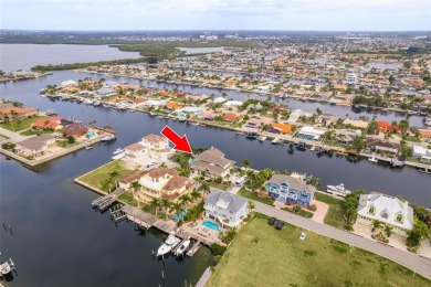 Go ahead and pinch yourself, because you're NOT dreaming and on Gulf Harbors Golf Course in Florida - for sale on GolfHomes.com, golf home, golf lot