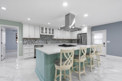 Beautifully updated all brick home nestled on 2.09 acres. 3 Bed on Palm Valley Golf Club in Florida - for sale on GolfHomes.com, golf home, golf lot