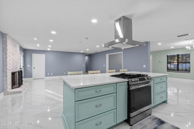 Beautifully updated all brick home nestled on 2.09 acres. 3 Bed on Palm Valley Golf Club in Florida - for sale on GolfHomes.com, golf home, golf lot