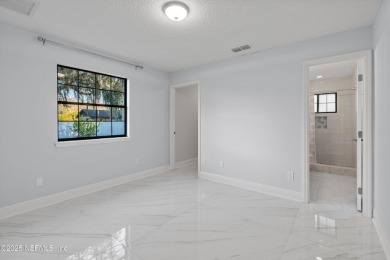 Beautifully updated all brick home nestled on 2.09 acres. 3 Bed on Palm Valley Golf Club in Florida - for sale on GolfHomes.com, golf home, golf lot