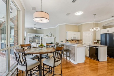 Stunning JA Long custom, all-brick home situated on the 17th on Eagle Harbor Golf Club in Florida - for sale on GolfHomes.com, golf home, golf lot