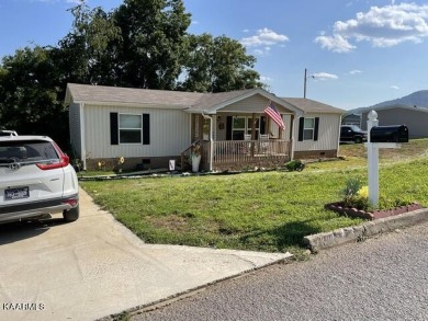 This is a beautiful, well cared for home,  It has a nice covered on Woodlake Golf Club in Tennessee - for sale on GolfHomes.com, golf home, golf lot