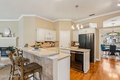 Stunning JA Long custom, all-brick home situated on the 17th on Eagle Harbor Golf Club in Florida - for sale on GolfHomes.com, golf home, golf lot