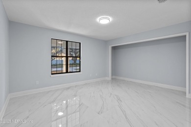 Beautifully updated all brick home nestled on 2.09 acres. 3 Bed on Palm Valley Golf Club in Florida - for sale on GolfHomes.com, golf home, golf lot