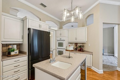 Stunning JA Long custom, all-brick home situated on the 17th on Eagle Harbor Golf Club in Florida - for sale on GolfHomes.com, golf home, golf lot