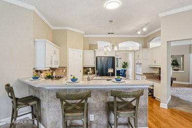 Stunning JA Long custom, all-brick home situated on the 17th on Eagle Harbor Golf Club in Florida - for sale on GolfHomes.com, golf home, golf lot