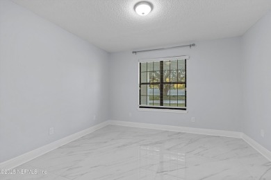 Beautifully updated all brick home nestled on 2.09 acres. 3 Bed on Palm Valley Golf Club in Florida - for sale on GolfHomes.com, golf home, golf lot