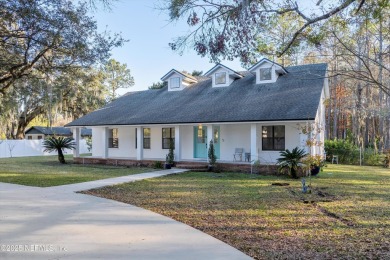 Beautifully updated all brick home nestled on 2.09 acres. 3 Bed on Palm Valley Golf Club in Florida - for sale on GolfHomes.com, golf home, golf lot