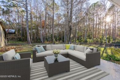 Beautifully updated all brick home nestled on 2.09 acres. 3 Bed on Palm Valley Golf Club in Florida - for sale on GolfHomes.com, golf home, golf lot
