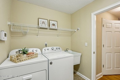 Stunning JA Long custom, all-brick home situated on the 17th on Eagle Harbor Golf Club in Florida - for sale on GolfHomes.com, golf home, golf lot