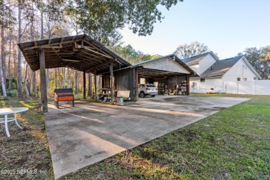 Beautifully updated all brick home nestled on 2.09 acres. 3 Bed on Palm Valley Golf Club in Florida - for sale on GolfHomes.com, golf home, golf lot