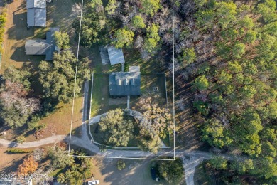 Beautifully updated all brick home nestled on 2.09 acres. 3 Bed on Palm Valley Golf Club in Florida - for sale on GolfHomes.com, golf home, golf lot
