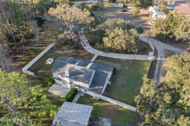 Beautifully updated all brick home nestled on 2.09 acres. 3 Bed on Palm Valley Golf Club in Florida - for sale on GolfHomes.com, golf home, golf lot