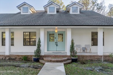 Beautifully updated all brick home nestled on 2.09 acres. 3 Bed on Palm Valley Golf Club in Florida - for sale on GolfHomes.com, golf home, golf lot