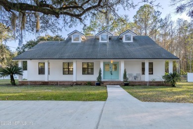 Beautifully updated all brick home nestled on 2.09 acres. 3 Bed on Palm Valley Golf Club in Florida - for sale on GolfHomes.com, golf home, golf lot