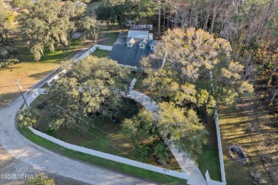 Beautifully updated all brick home nestled on 2.09 acres. 3 Bed on Palm Valley Golf Club in Florida - for sale on GolfHomes.com, golf home, golf lot