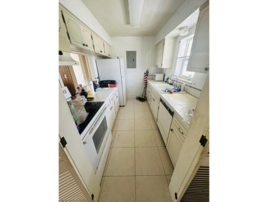 This 1/1 2nd story condo in Corinthian Condo Apts Marina could on North Palm Beach Country Club in Florida - for sale on GolfHomes.com, golf home, golf lot