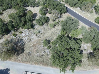 Oak tree covered 1/3 acre corner lot in Horseshoe Bay with nice on Slick Rock Golf Course - Horseshoe Bay in Texas - for sale on GolfHomes.com, golf home, golf lot