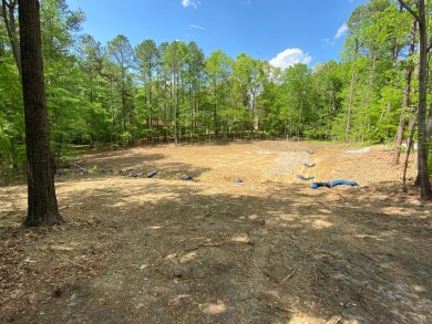 Building lot in the cul-de-sac on Sidney Hill recently cleared on Henderson Country Club in North Carolina - for sale on GolfHomes.com, golf home, golf lot